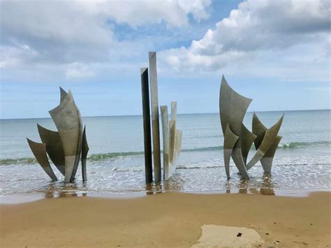 Remembering The Fallen: Paying Tribute On Normandy's Historic Beaches ...