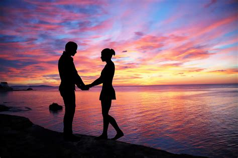 Couple facing each other on seashore during sunset HD wallpaper ...