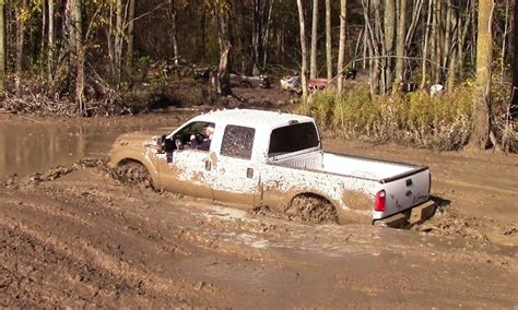 20 Photos Of Trucks Hopelessly Stuck In Mud