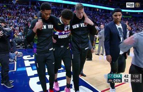 Video: Jamal Murray carried off court with ankle injury | Larry Brown ...