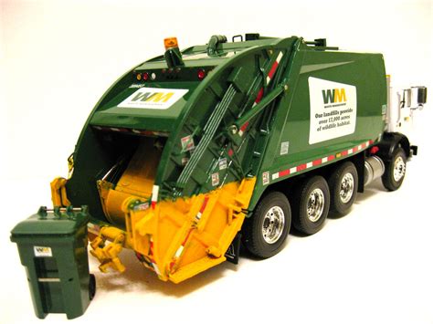 First Gear Waste Management Mack Mr rear load garbage truck. - a photo ...