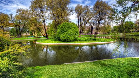 Beautiful Greenery Park With Lake And Trees In Building Background HD ...