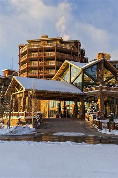 a large building that has snow on the ground