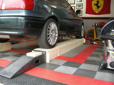 Awesome DIY car ramp! The middle section comes out after the car is on ...