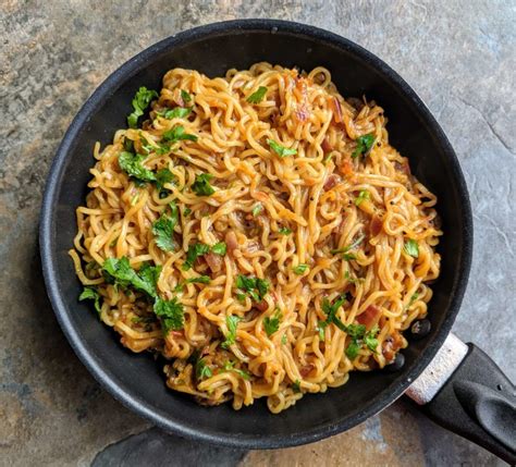 Street style maggi noodles are a spicy snack made by tossing maggi ...