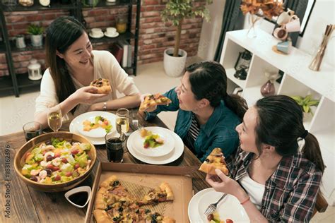 top view of the group of people eating Stock Photo | Adobe Stock