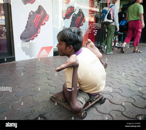 A street beggar on Colaba Causeway, Colaba, Mumbai, India Stock Photo ...