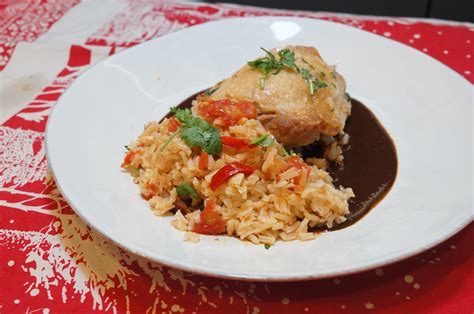 Arroz con Pollo on a bed of Mole | Cocina California