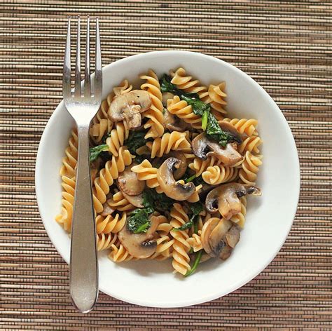 Whole Grain Fusilli with browned Mushrooms and Spinach. vegan - Vegan Richa