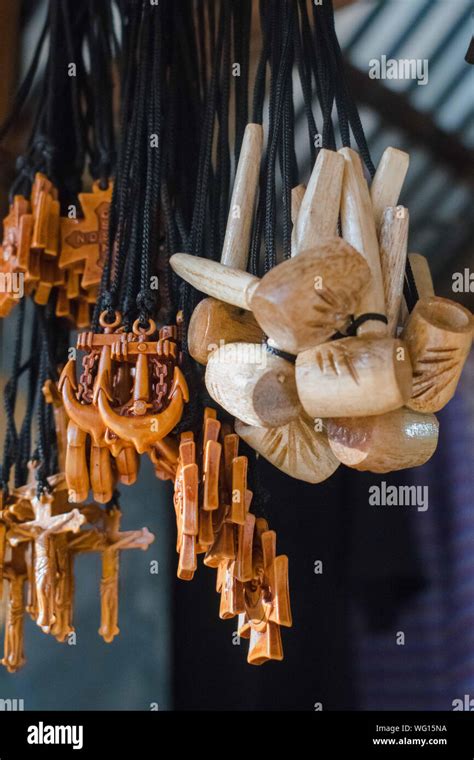 AUGUST 25, 2019-BANAUE IFUGAO PHILIPPINES: Small wooden carved necklace ...