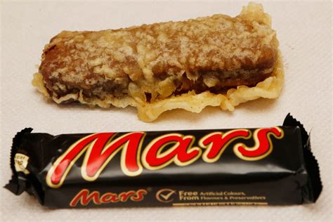 Deep-fried Mars Bars should be used to draw more visitors to Scotland ...