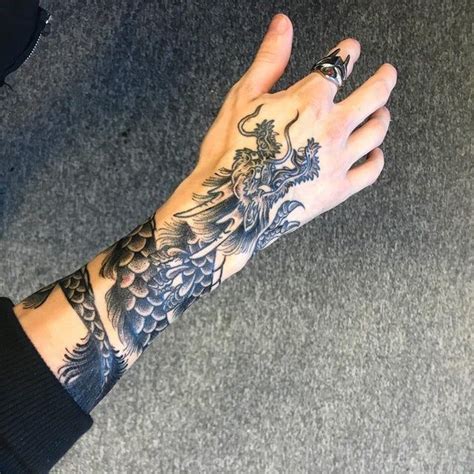 Pin by Nicole P on Sian ♌ | Dragon hand tattoo, Hand tattoos, Tattoos