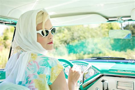 Woman Driving Vintage Car on Road during Daytime · Free Stock Photo