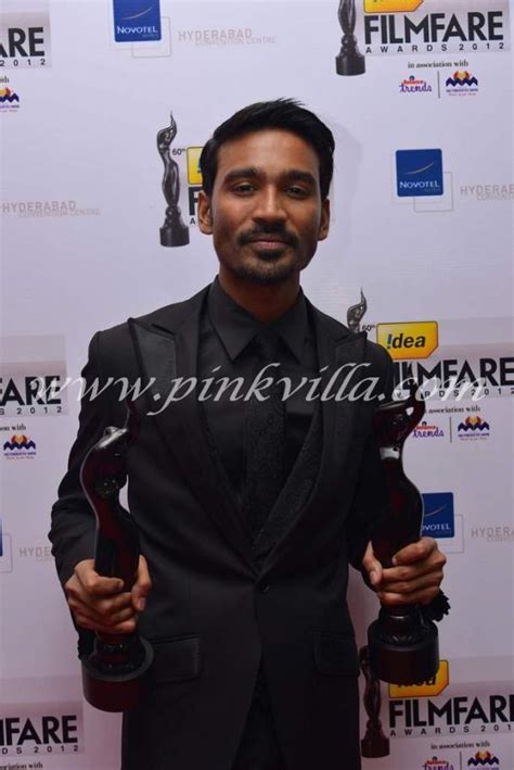 Dhanush with wife Aishwarya at the FilmFare Awards South