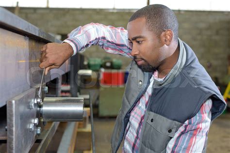 fixing a machine | Stock image | Colourbox