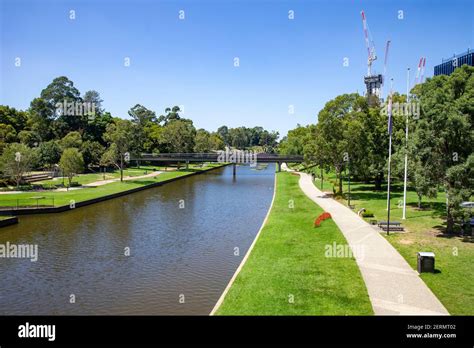 Parramatta river in the city centre with green open space on the ...