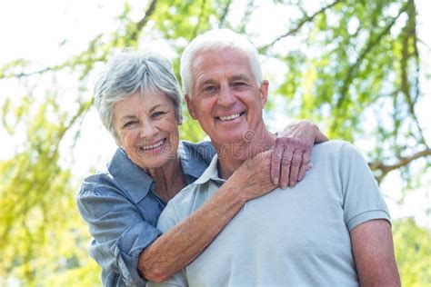 Happy Senior Couple on Vacation Stock Photo - Image of aged, playful ...