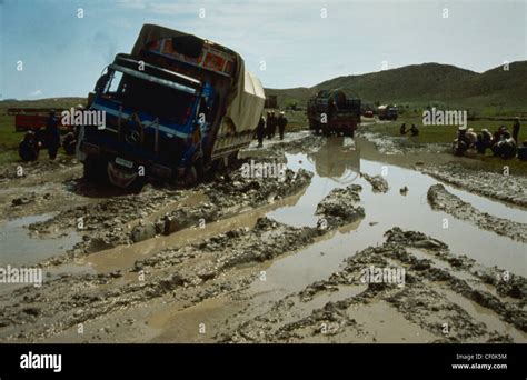 A truck stuck i the mud Stock Photo - Alamy