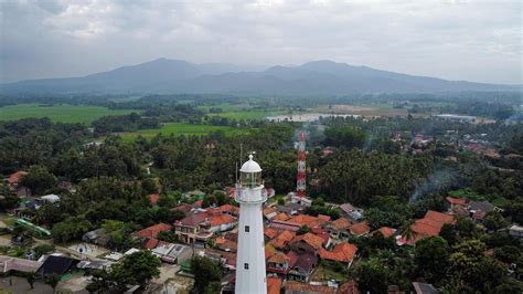 Banten, Indonesia 2021-- Aerial view of Lighthouse sea rock sunset ...