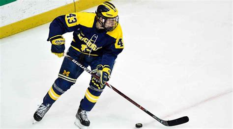 Quinn Hughes puts off Canucks contract, returns to Michigan - Sports ...