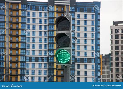 Green Traffic Light on the Background of Buildings Stock Image - Image ...