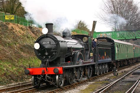 LSWR T9 30120, built at Nine Elms in 1899, approaching Ropley from ...