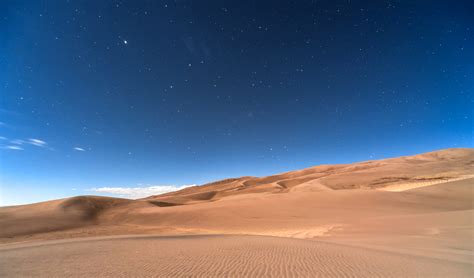 Sky and Stars at Night above the Desert landscape in Colorado image ...