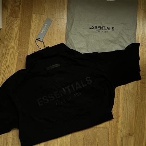 Essentials Men's Black Polo-shirts | Depop