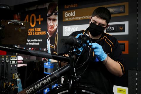 UK's Halfords bumps up profit outlook ahead of Christmas | Reuters