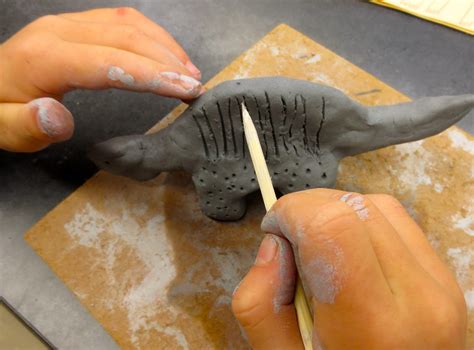 Zilker Elementary Art Class: 1st Grade Clay Dinosaur Sculptures