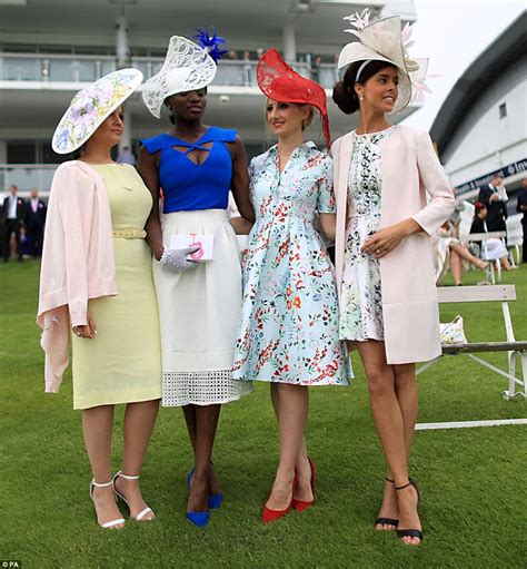 Racegoers turn Epsom into a riot of colour on Ladies Day | Daily Mail ...