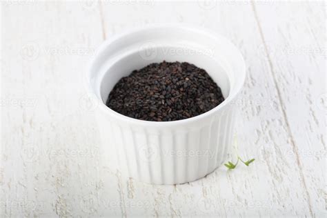 Black sesame seeds 7706139 Stock Photo at Vecteezy