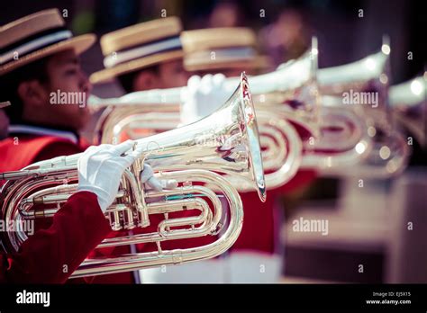 Brass Band in red uniform performing Stock Photo - Alamy