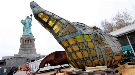 Statue of Liberty's Original Torch Moved to Museum Site