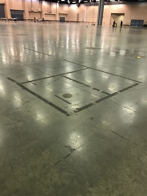 Warehouse Floor Tape Concerns | Concrete Floor Striping | Titus Restoration