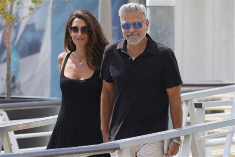 George Clooney and Amal Clooney Hold Hands as They Leave Venice After ...