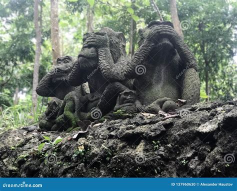 Three Monkeys Statues Which Have Different Posts. Cambodia Stock Photo ...