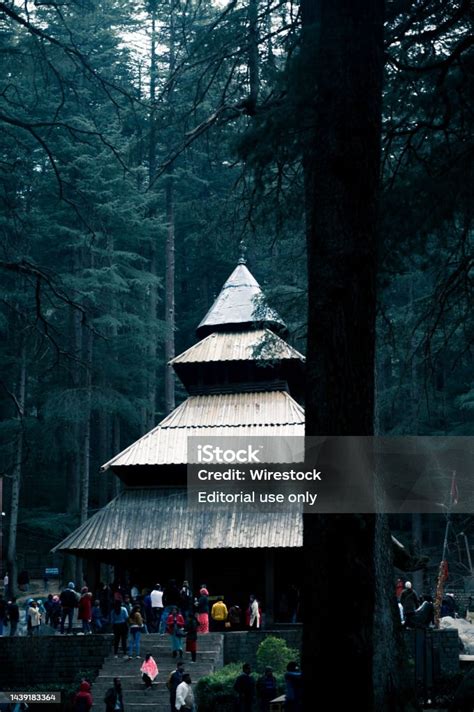 People Walking Inside The Hadimba Temple Situated Inside A Pine Tree ...