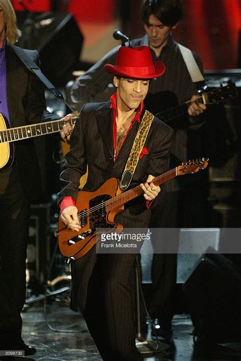 Inductee Prince performs following George Harrison's induction at the ...