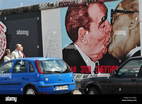 John Malkovich and his family visit the 'Eastside Gallery', the remains ...