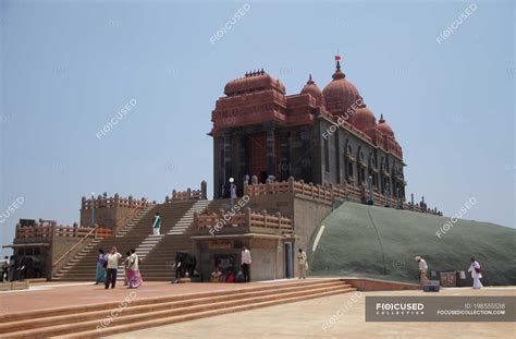 Piligrims at the sunrise near Vivekananda Rock Memorial and ...