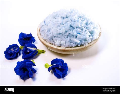 Blue color cooked rice by color of butterfly pea flower Stock Photo - Alamy