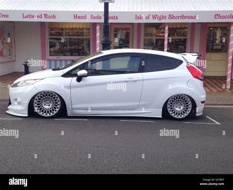 A street-legal Ford Fiesta with modified hydraulic suspension parked ...