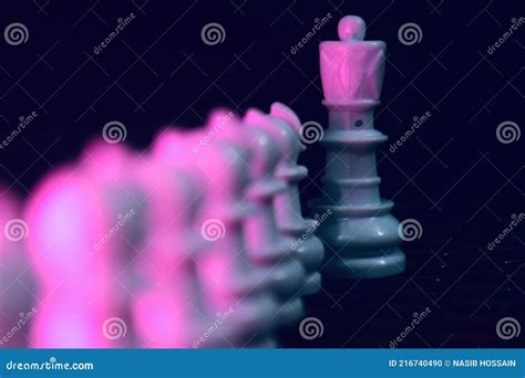 Traditional Plastic Chess Pieces with Pink Light Effects Stock Photo ...