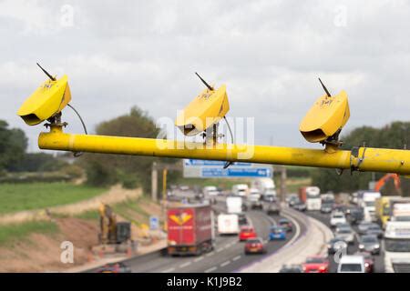 Average speed cameras on the M6 motorway in Cheshire,UK Stock Photo - Alamy