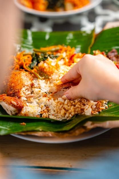 Premium Photo | Indonesian padang food or nasi bungkus with padang ...