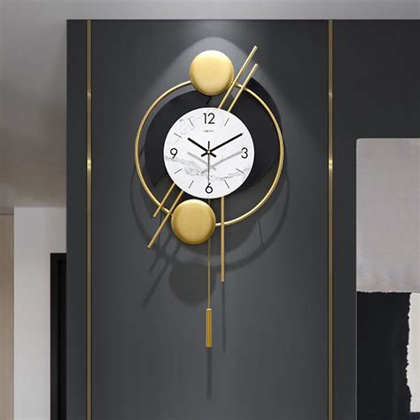 Modern Distinctive Metal Wall Clock with Gold Pendulum | Homary ...