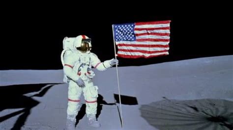 Astronaut On Moon By The American Flag