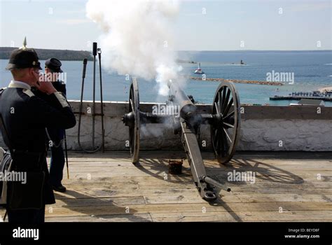 Cannon being fired in Fort Mackinac, Mackinac Island, Michigan Stock ...