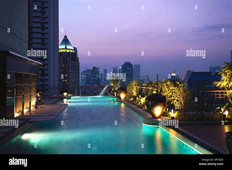 Illuminated pool on the roof of Hotel Banyan Tree, Bangkok, Thailand ...